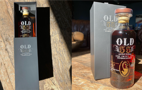 bottle of bourbon next to its packaging carton